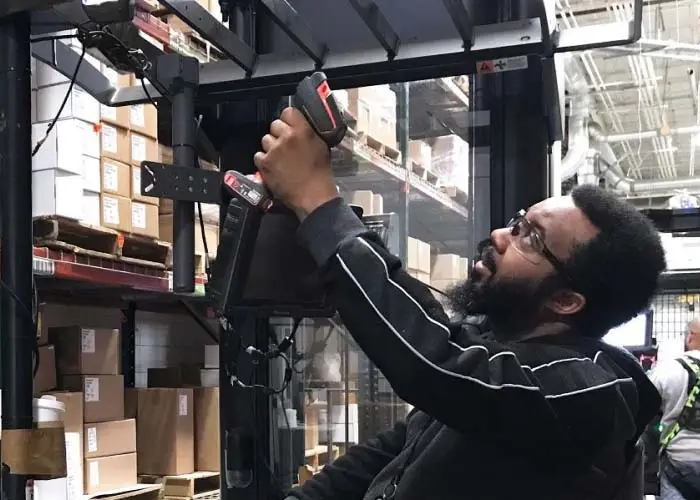 Man using rugged handheld scanner